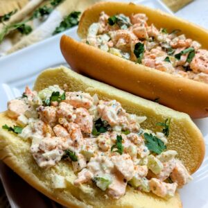 old bay shrimp salad sandwiches with lemon and celery and fresh herbs.